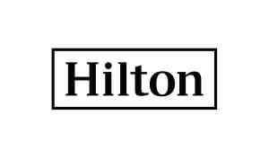 Mike Hathcote Telly Award-Winning Voiceover Talent Hilton Logo